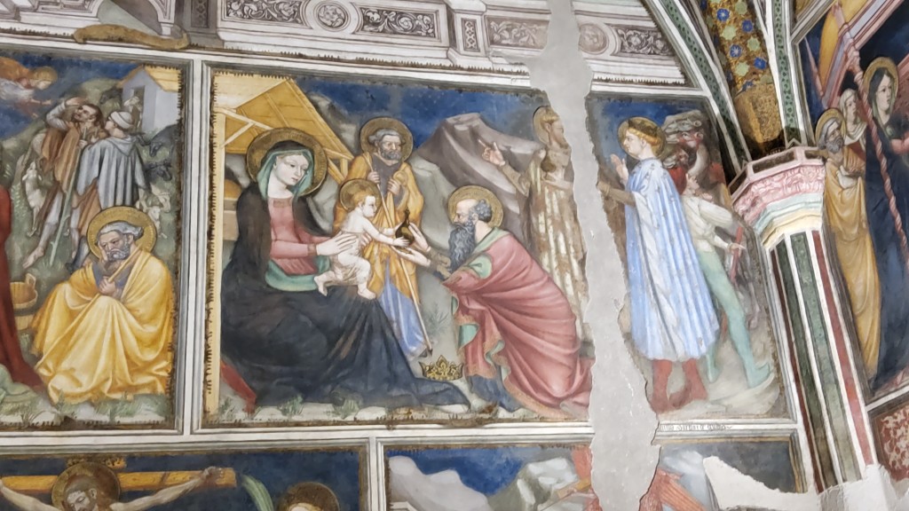 Einer der drei übergibt dem Kind seine Gabe, Detail der Ausmalung einer Kapell von Ottaviano Nelli, 1424; zu sehen in, Foligno